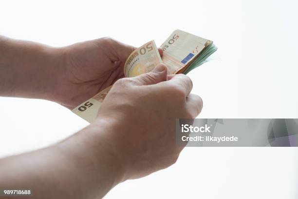 Man Counting Euro Stock Photo - Download Image Now - Adult, Adults Only, Banking