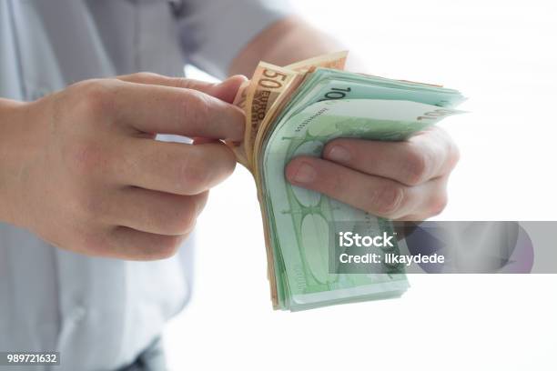 Man Counting Euro Stock Photo - Download Image Now - Adult, Adults Only, Banking