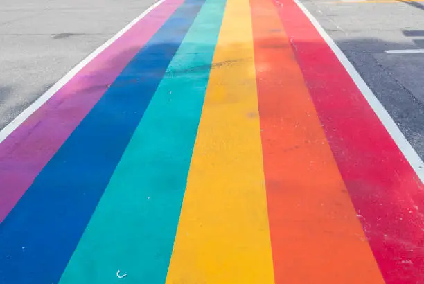 Photo of Rainbow coloured crosswalk for Pride Month on Church street in Toronto