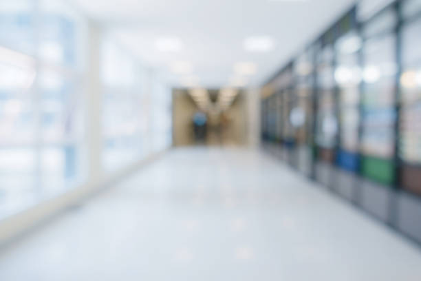 istock blur image background of corridor office hospital walkway 989797780