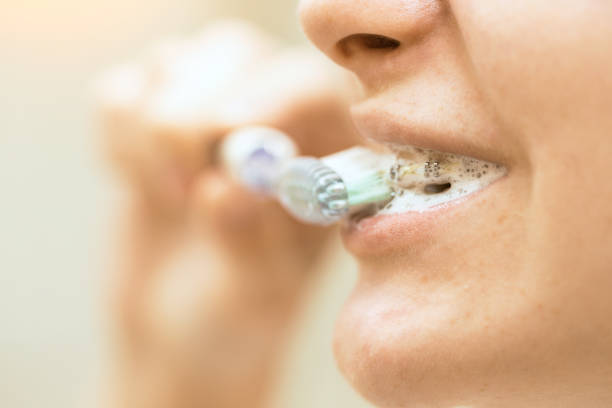 istock a girl with braces close-up 989801162