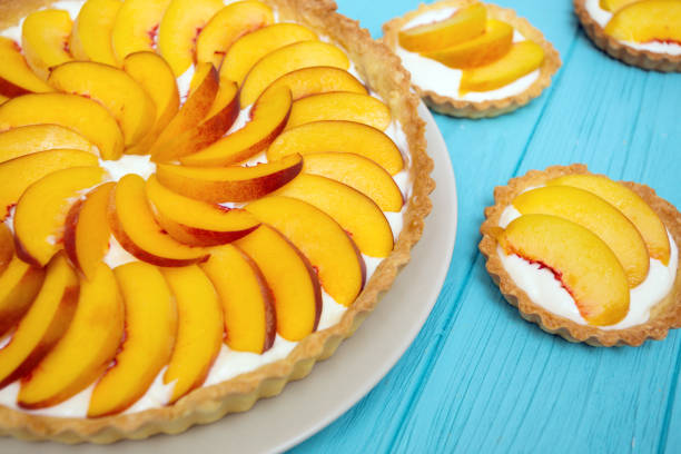 istock Delicious, useful and beautiful tartlets with peach 989813588