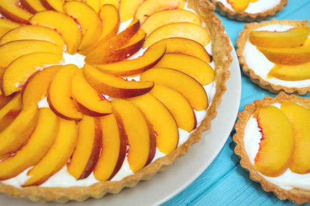 istock Delicious, useful and beautiful tartlets with peach 989813652
