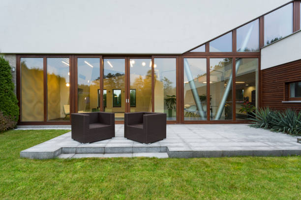 istock Villa patio with rattan chairs 989835418