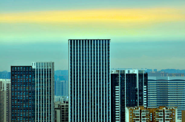 istock City background in sunset 989854508