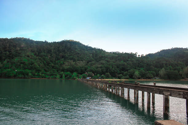 istock Concrete bridges stretched into the sea. 989860794