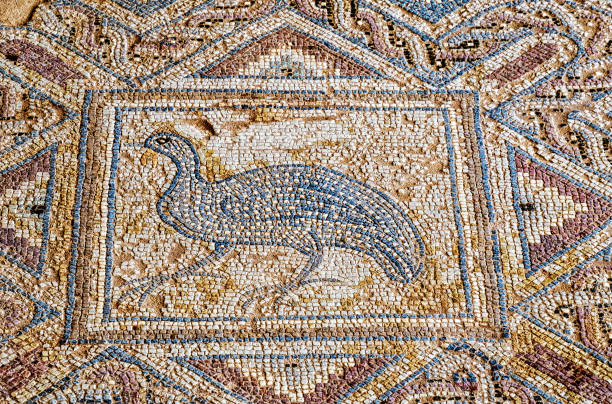 Floor tiles in Kourion, Cyprus KOURION, CYPRUS, MAY 17, 2016 - Floor tiles have recently been restored kourion stock pictures, royalty-free photos & images
