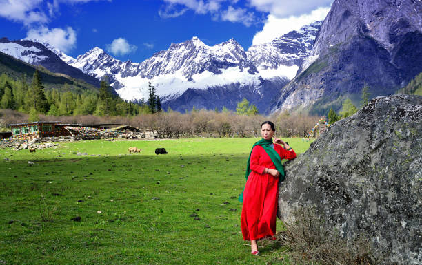 istock A woman is in the mountains 989945680