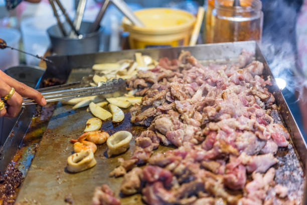 istock Grilled raw meat cooking on wagyu grill 989958600