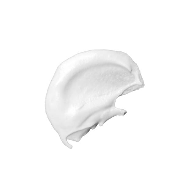 istock Cosmetic cream isolated on white background 989969530