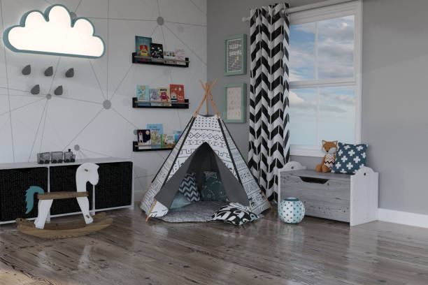 istock Kids Tepee room set up with toys and books, 3d render. 989979352
