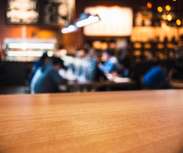 istock Table top counter Blur People Bar Restaurant background 990021712