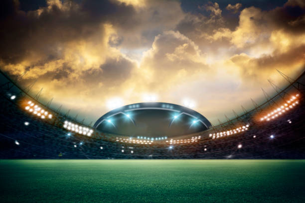 istock stadium in lights and flashes 3d. Mixed photos 990033062
