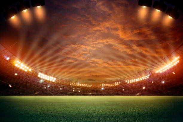 istock stadium in lights and flashes 3d. Mixed photos 990033106