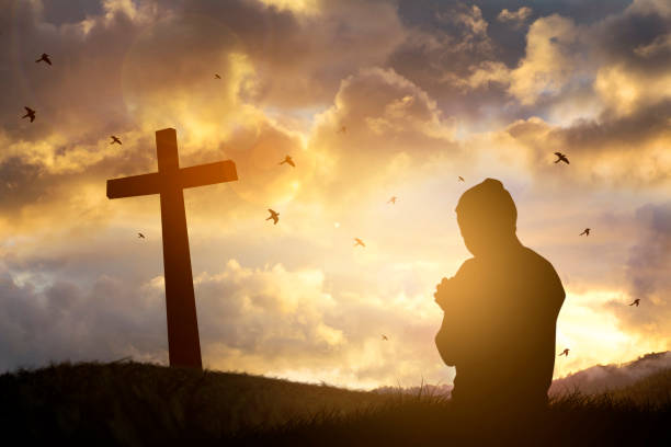 istock Christian prayers raising hand while praying to the Jesus. 990033490