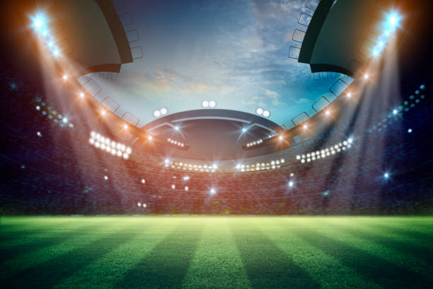 istock lights at night and football stadium 3d rendering. 990053480