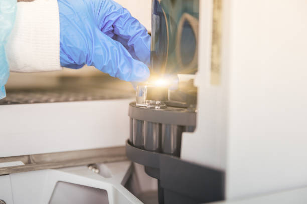 istock Close-up of female chemist at work in laboratory 990060830