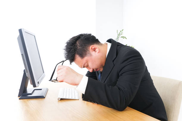istock Tired businessperson image 990064770