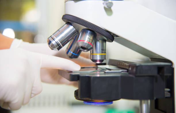 istock Close up microscope in laboratory.Medical background. 990070168