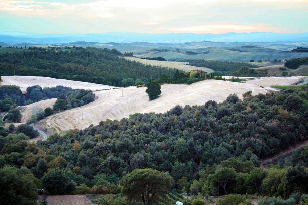istock sunset on tuscan countryside 990070906