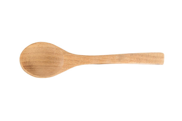 istock Close up spoon wood on white background. 990071698
