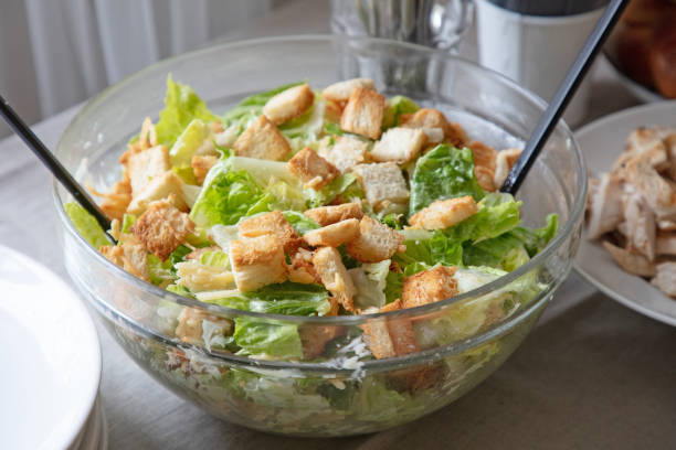 istock bowl of homemade cesar salad 990078206