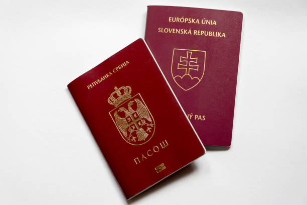 istock Serbian and Slovak passport isolated on white background 990082332