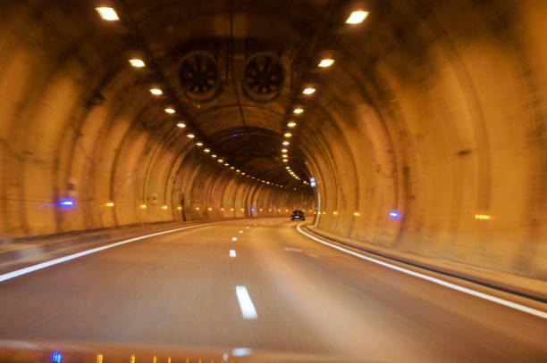istock Turn the road in the tunnel. 990101798