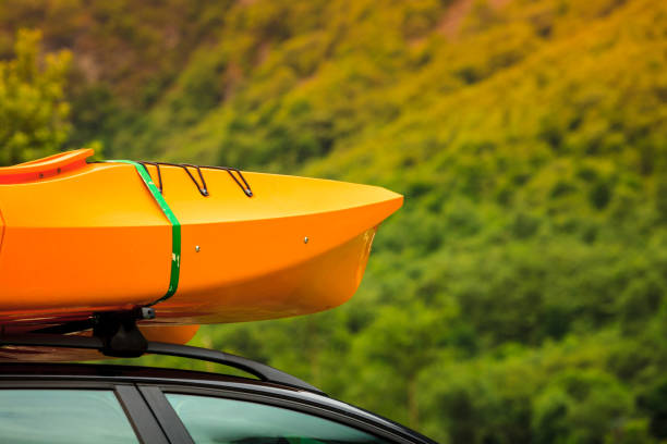 istock Car with canoes on top 990116424