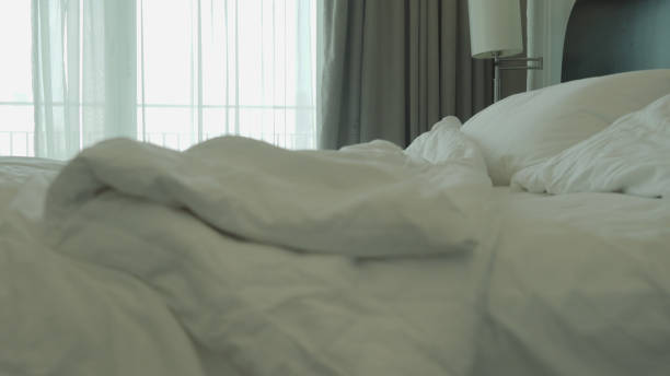 istock People take a rest at Hotel on bunk bed 990129614