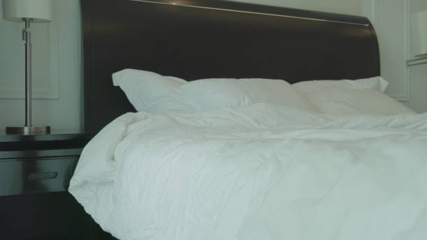 istock People take a rest at Hotel on bunk bed 990129646