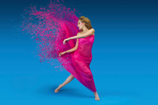 istock Fashionable girl with silky fabric 990190900