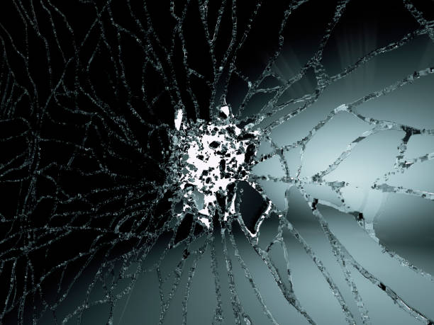 istock Pieces of destructed Shattered glass on white. 3d illustration; 3d rendering 990192390