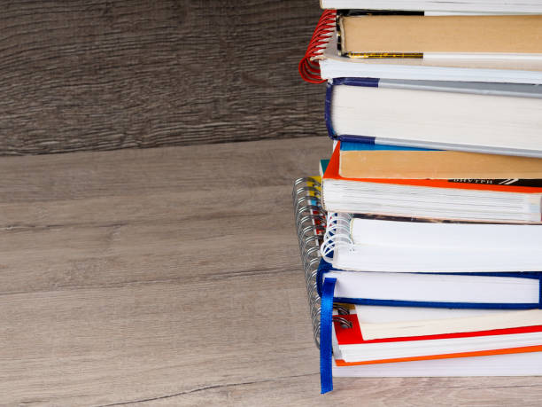 istock The book is on a wooden table. 990200238