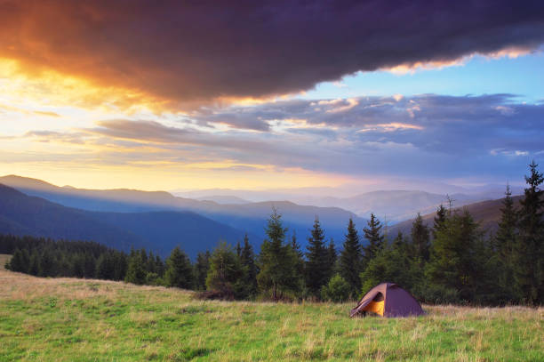 istock Tourist tent in the mountains 990201306