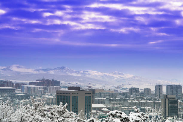 Panorama of the capital of Kosovo, Pristina covered in snow with hills in the background