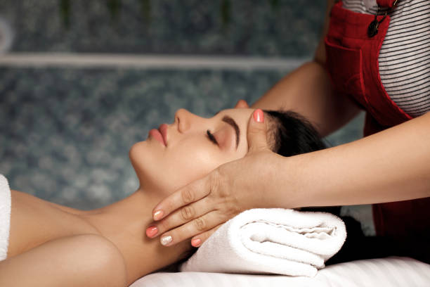 istock anti-aging facial massage. 990237836