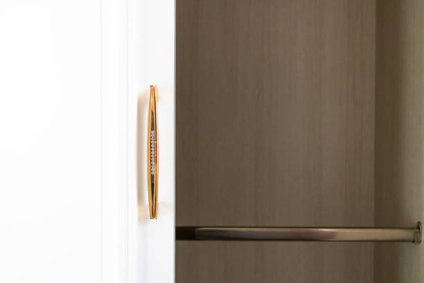 istock Golden Door Handle with Diamond The white cabinets 990246944