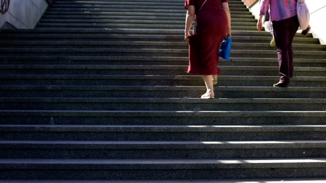 Obese woman running upstairs, intensive trainings outdoors to lose weight