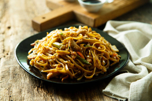 istock Asian chicken noodles with vegetables 990253062