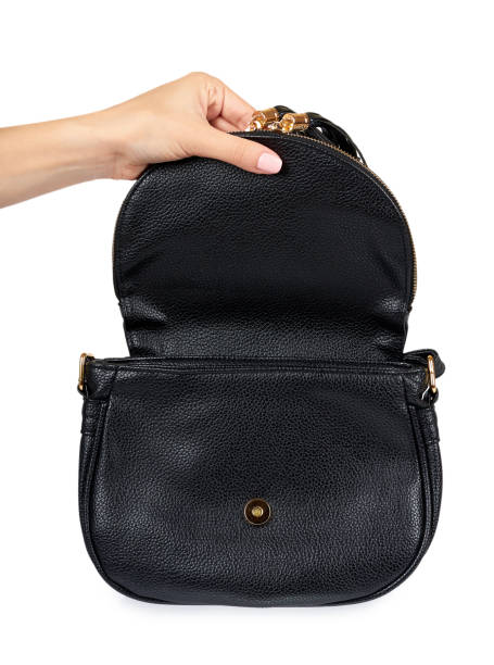 istock Black leather shoulder bag isolated on a white background. 990259156