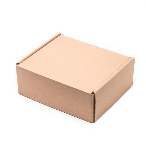 istock A cardboard box with negative space isolated on white background. 990259226