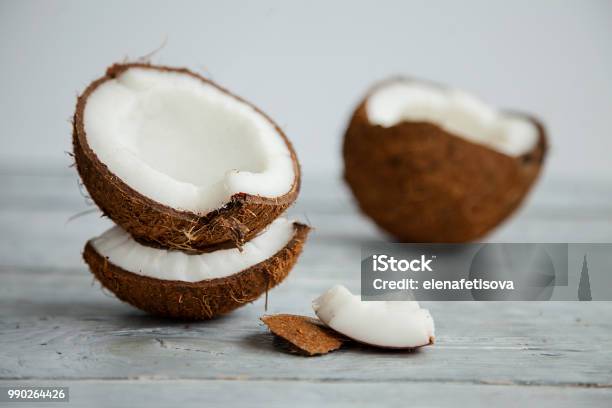 Fresh Organic Coconut On Rustic Wooden Background Stock Photo - Download Image Now - Coconut, Brown, Freshness