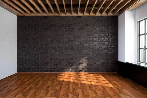 Photo of Empty Room with Black Brick Wall
