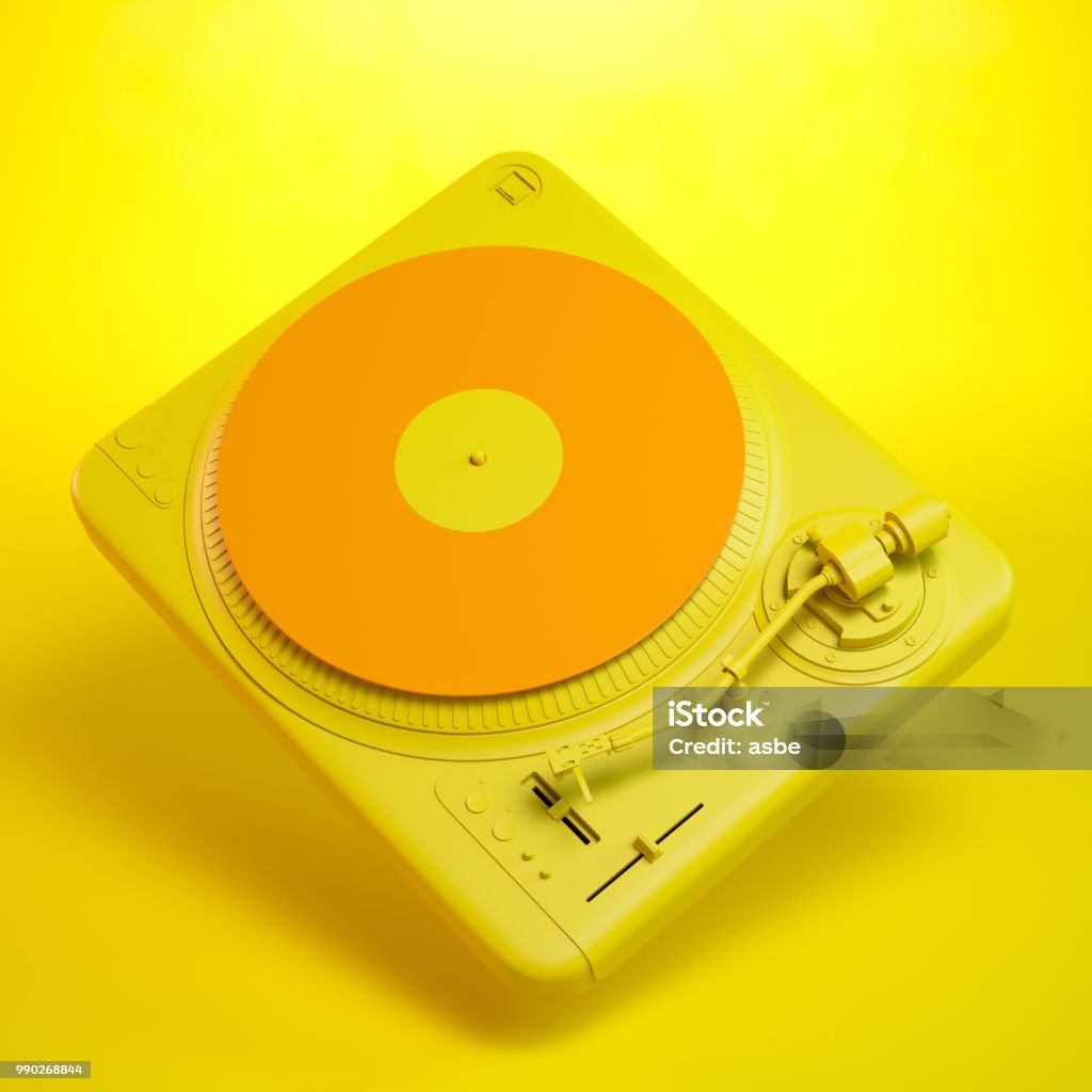 Plateau tournant sur fond Orange coloré - Photo de Platine de disque vinyle libre de droits