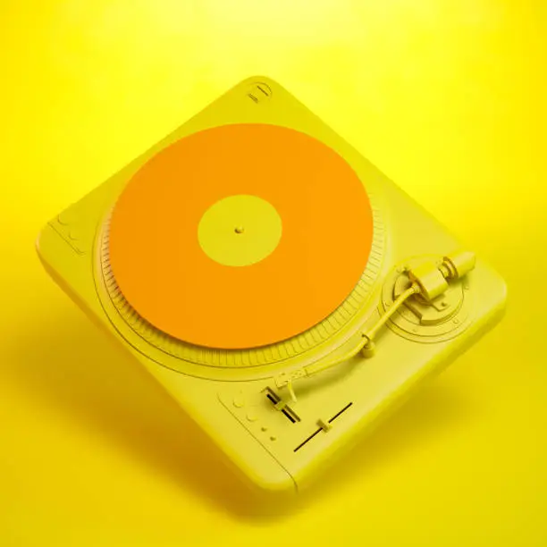 Orange and yellow turntable on yellow background