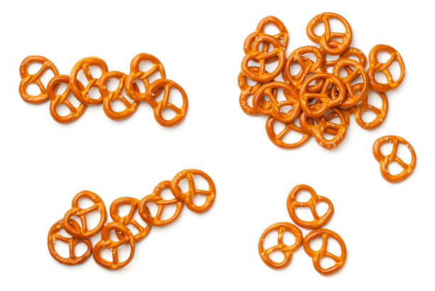 Pretzels Isolated on White Background Pretzels isolated on white background. Flat lay. Top view pretzel photos stock pictures, royalty-free photos & images