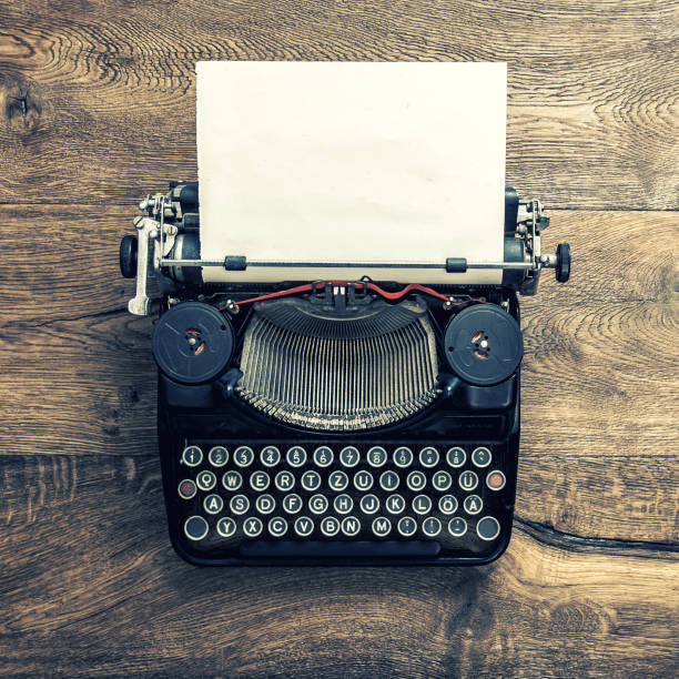 istock Antique typewriter vintage toned picture 990284434