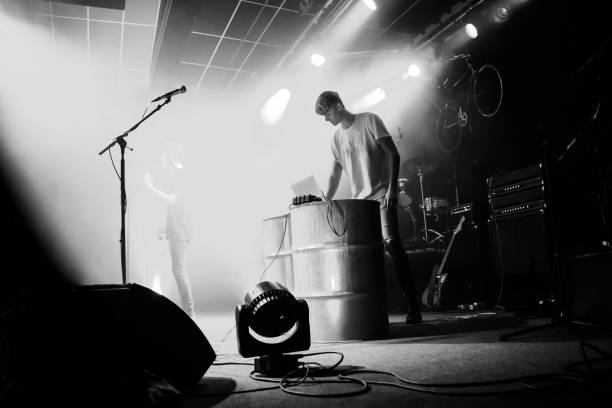istock Yonung rock band in action on stage 990284746