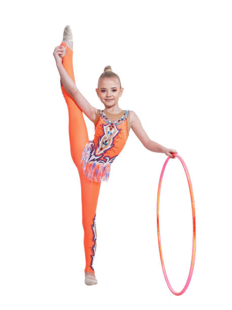 Gimnasta Chica Poco Está Vestido Con Leotardos De Deportes Foto de stock y más banco de imágenes de Gimnasia rítmica - iStock Gimnasta Chica Poco Está Vestido Con Leotardos De Deportes Foto de stock y más banco de imágenes de Gimnasia rítmica - iStock